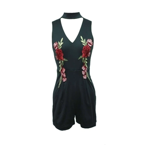 Women's black V-neck halter romper featuring elegant red rose floral embroidery details