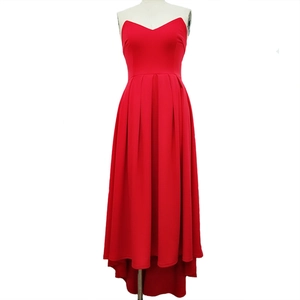 Elegant strapless red evening gown with pleated flare skirt and heart-shaped neckline