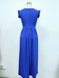 Detail of royal blue dress featuring ruffle sleeves and a hidden zipper on the back