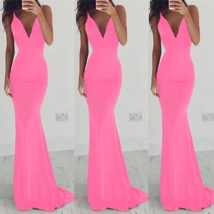 Detail of neon pink backless mermaid dress with deep V-neck and slim fit silhouette
