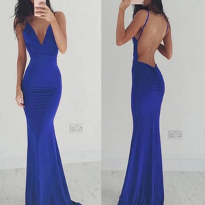 Detail of royal blue backless mermaid dress with thin straps and deep V-neckline