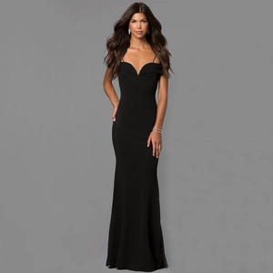 Detailed view of elegant sweetheart V-neck and slim spaghetti straps on black evening gown