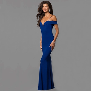 Detail of royal blue off-shoulder evening dress with spaghetti straps and mermaid cut