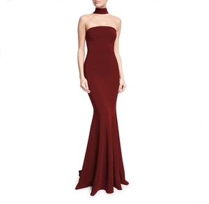 Detail of burgundy mermaid evening dress with strapless neckline and matching choker
