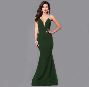Detail of elegant dark green mermaid dress with deep V-neck and slim fit backless design