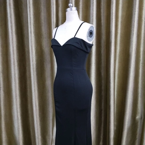 Close-up of black off-the-shoulder evening gown with slim straps and sleek fitted bodice