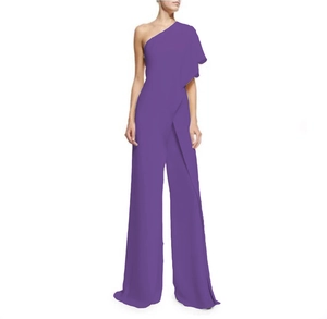 Detail of elegant purple one-shoulder jumpsuit with ruffled cape sleeve and high waist cut