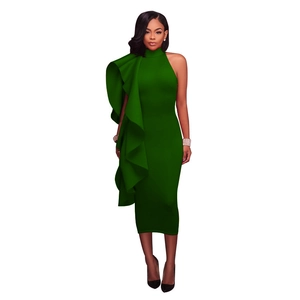 Detail of ruffle sleeve and sleek slim-fit design on a dark green evening party dress