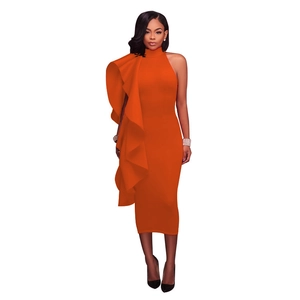Detail of vibrant orange slim-fit dress with ruffled tiered layers and high neckline