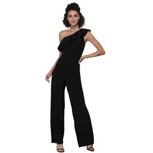 Detail of elegant one-shoulder black jumpsuit featuring a ruffled neckline and wide legs