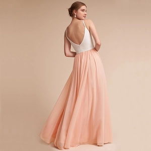 Elegant backless chiffon maxi dress with white tank top and pleated peach skirt