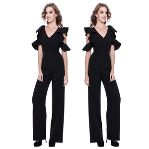 Detail of elegant V-neck jumpsuit with ruffle off-shoulder sleeves and wide-leg trousers