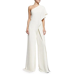 Detail of elegant white one-shoulder jumpsuit with layered ruffles and wide-leg trousers