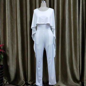Elegant white cape overlay jumpsuit with sleeveless bodice and high waist straight leg cut