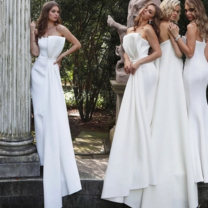 Elegant strapless floor-length white satin evening jumpsuit with 3D ruffle detail