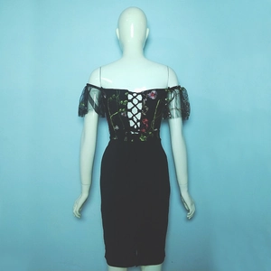 Black off-shoulder dress featuring floral embroidery, mesh sleeves, and lace-up back detail