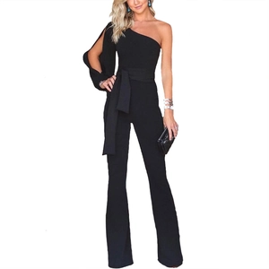 Detail of elegant black one-shoulder jumpsuit with waist tie and side-split sleeve