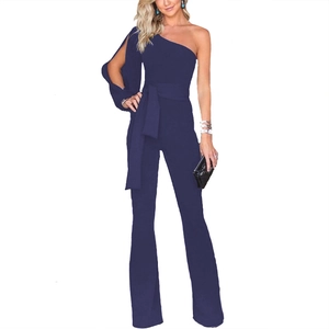 Detail of navy blue one shoulder jumpsuit with split sleeve and waist tie belt