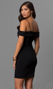 Detailed back view of a slim fit black cocktail dress with delicate spaghetti straps