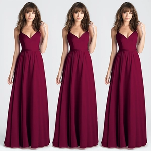 Detailed view of burgundy floor-length evening dress with slim straps and V-neckline