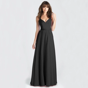 Detail of elegant black long evening dress featuring thin straps and V-neckline chiffon fabric