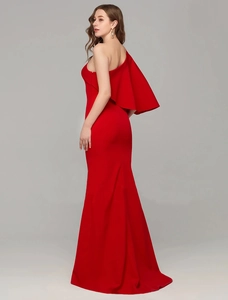 Rear view of elegant red one-shoulder evening gown with ruffled sleeve and mermaid tail