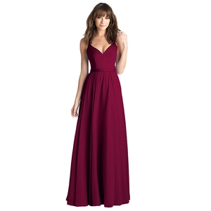 Detail of elegant burgundy long dress featuring a deep V-neck and high waist A-line silhouette