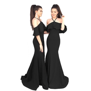 Elegant black off-shoulder fishtail maxi dress with ruffle sleeves and slim fit silhouette