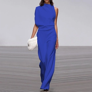 Close-up of royal blue jumpsuit featuring an asymmetrical high neck and wide-leg design