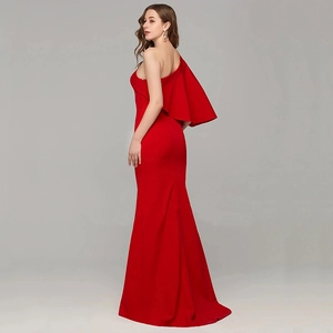 Elegant red one-shoulder evening gown with ruffled sleeve and floor-length mermaid tail