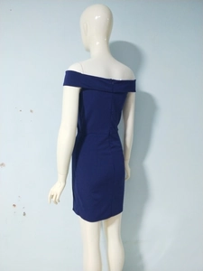 Detail view of the back of a navy blue off-shoulder mini dress with invisible zipper