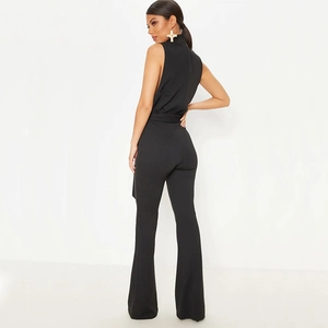 Elegant black sleeveless jumpsuit with high neck, waist tie, and slimming flared leg pants