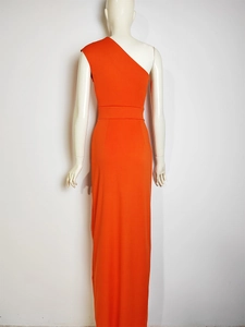 Rear view of the bright orange one-shoulder maxi dress with floor-length slim fit design