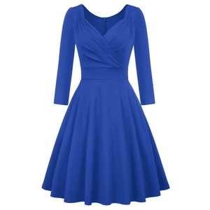Detail of royal blue A-line cocktail dress showing V-neckline and 3/4 sleeves