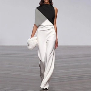 Sleeveless patchwork halter jumpsuit with white wide-leg trousers and minimal design
