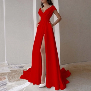 Detail view of red V-neck floor-length evening gown with high slit and side pockets