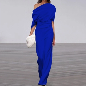 Detail of royal blue one-shoulder wide-leg jumpsuit with elegant pleated bodice