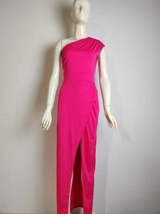 Detail of rose pink one-shoulder maxi dress with high waist and elegant front split