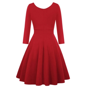 Back view of a vibrant red A-line knit dress featuring a fitted waist and elegant silhouette