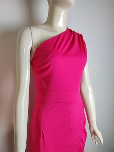 Detail of rose red one-shoulder dress showing pleated shoulder and high waist cut