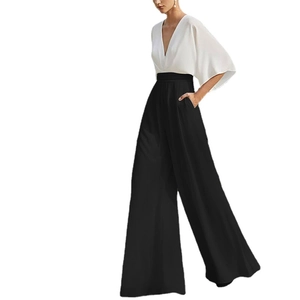 Elegant deep V-neck wide leg jumpsuit in black and white contrast for a formal look