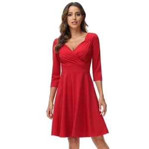 Elegant red V-neck cocktail dress with three-quarter sleeves and pleated waist details