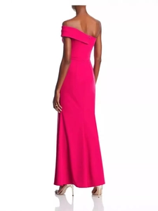 Detail view of the sleek back design and form-fitting silhouette of the magenta evening gown