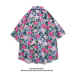 Back view of a Hawaiian short sleeve shirt with tropical floral print in navy and pink