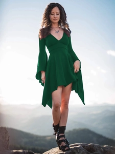 Detail of deep V-neck dark green dress with flared sleeves and irregular jagged hem
