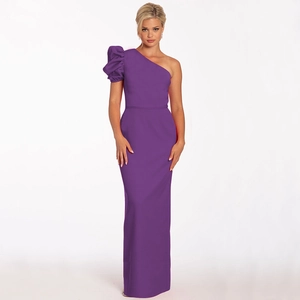 Detail of elegant one-shoulder purple evening gown with a ruffled lantern sleeve design