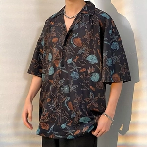 Hawaiian floral print shirt with marine theme icons and a relaxed Cuban collar style