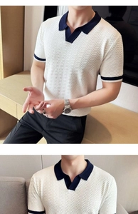 Close-up of herringbone knit texture on white polo shirt with navy contrast collar