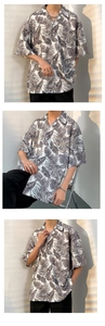 Detailed view of lightweight palm leaf print oversized summer shirt with cuban collar