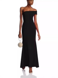 Elegant black one-shoulder evening maxi dress with side slit for formal occasions